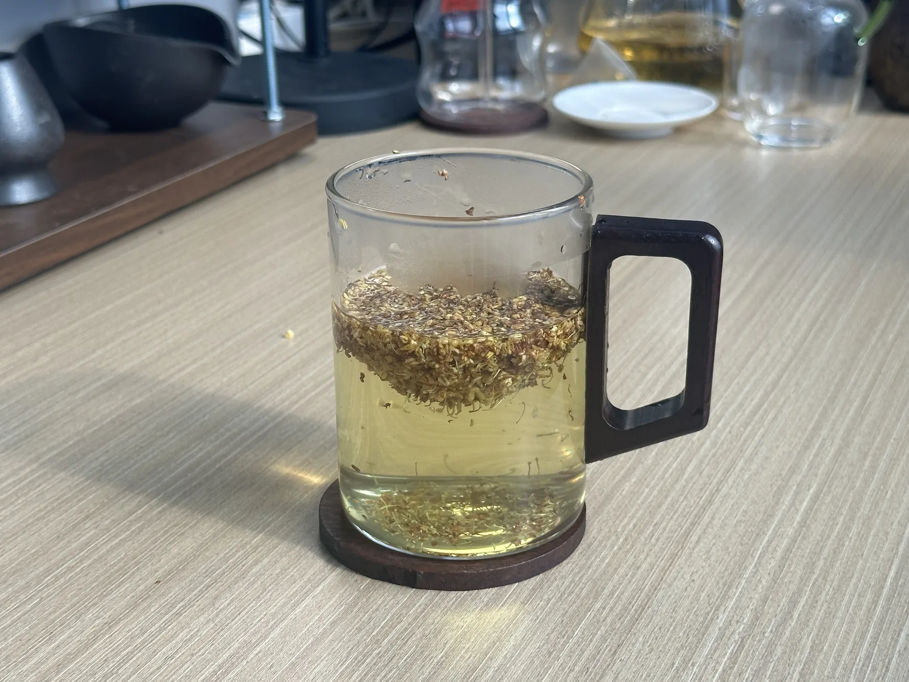 Hot osmanthus infusion in a clear glass cup